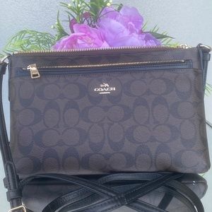 Coach Purse.. Brown. Used once. Height=7inches Width=11 inches